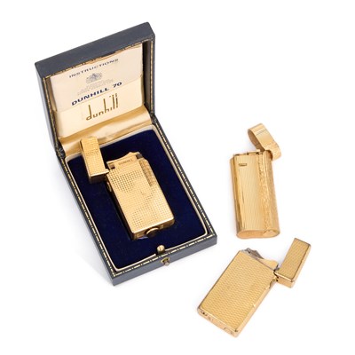 Lot 955 - THREE GOLD PLATED DUNHILL LIGHTERS