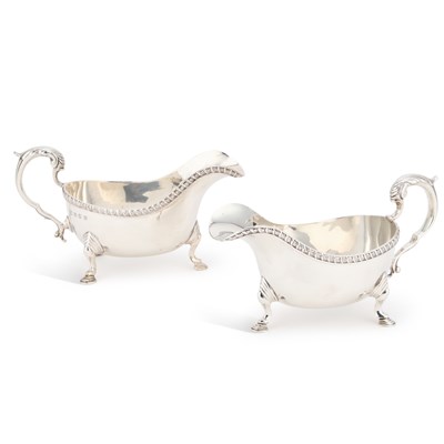 Lot 325 - A PAIR OF GEORGE V SCOTTISH SILVER SAUCEBOATS