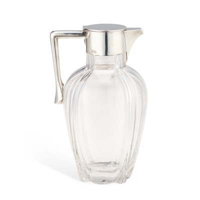 Lot 445 - A LATE VICTORIAN SILVER-MOUNTED GLASS CLARET JUG