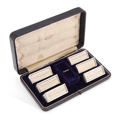 Lot 282 - A SET OF SIX EDWARDIAN SILVER NAPKIN RINGS