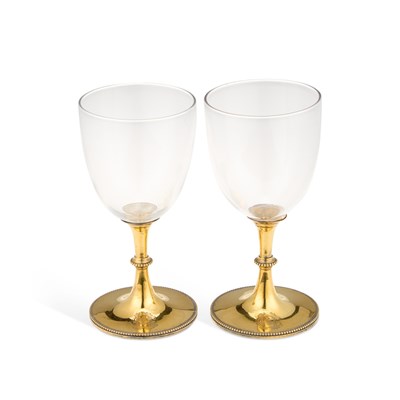 Lot 454 - A PAIR OF VICTORIAN SILVER-GILT FOOTED GLASSES