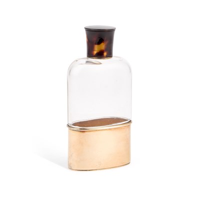 Lot 387 - A GEORGE V SILVER-GILT AND GLASS HIP FLASK