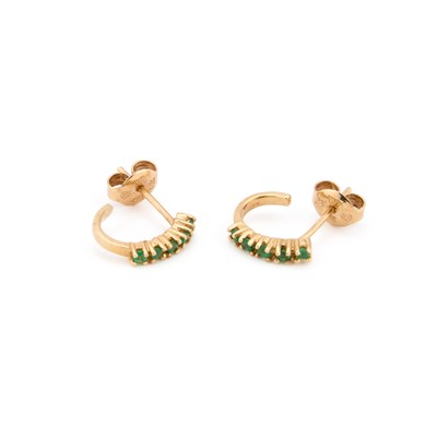 Lot 849 - A PAIR OF EMERALD HALF HOOP RINGS