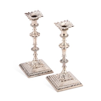 Lot 511 - A PAIR OF GEORGE III CAST SILVER TAPERSTICKS