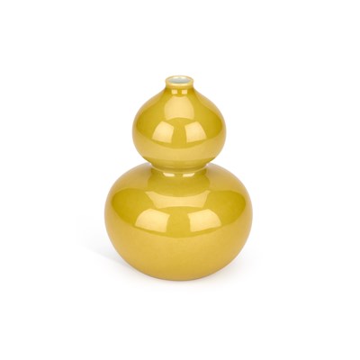 Lot 644 - A CHINESE YELLOW-GLAZED DOUBLE-GOURD VASE