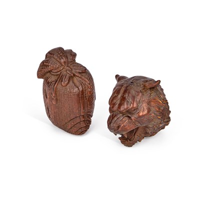 Lot 665 - A CHINESE CARVED MODEL OF A SACK OF RICE AND A HARDWOOD TOGGLE