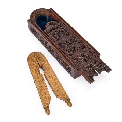 Lot 1228 - A 19TH CENTURY SPANISH CARVED WOOD PINE NUT CRACKER AND CASE
