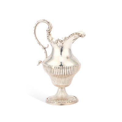 Lot 597 - A GEORGE III SILVER EWER