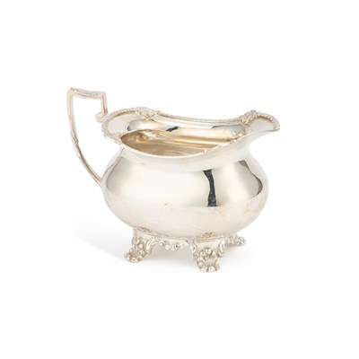Lot 337 - AN EDWARD VIII SILVER CREAM JUG