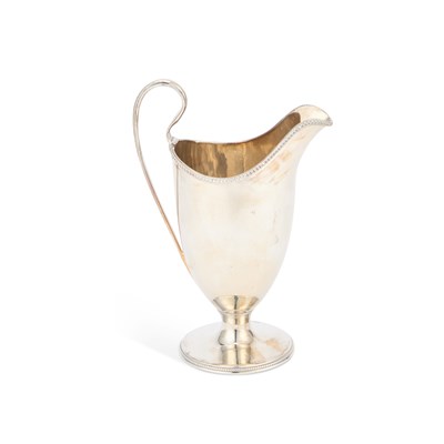 Lot 600 - A GEORGE III SILVER CREAM JUG