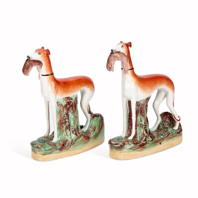 Lot 42 - A PAIR OF VICTORIAN STAFFORDSHIRE POTTERY GREYHOUND COURSING FIGURES