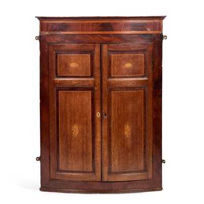 Lot 1045 - A GEORGE III INLAID OAK AND MAHOGANY HANGING BOW-FRONT CORNER CUPBOARD