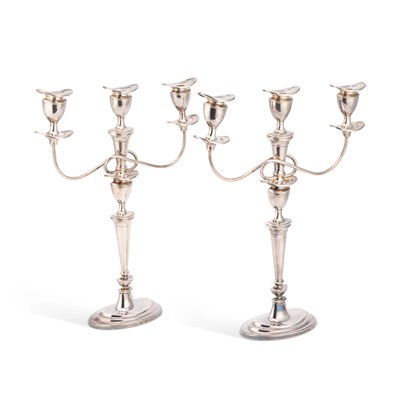 Lot 438 - A PAIR OF ELIZABETH II SILVER CANDELABRA