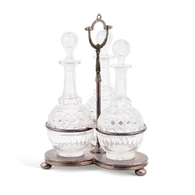 Lot 160 - A VICTORIAN SILVER-PLATED THREE-BOTTLE DECANTER STAND