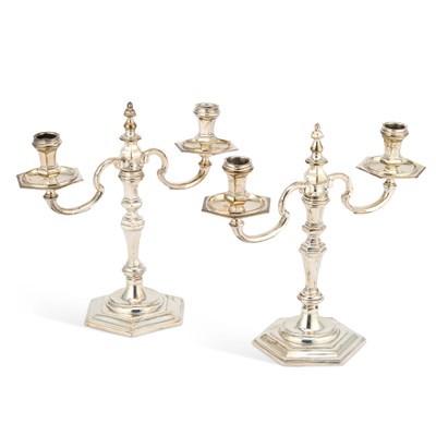 Lot 422 - A PAIR OF ELIZABETH II CAST SILVER CANDELABRA