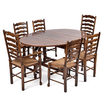 Lot 1244 - AN 18TH CENTURY STYLE OAK GATELEG DINING TABLE AND SIX LADDER-BACK CHAIRS