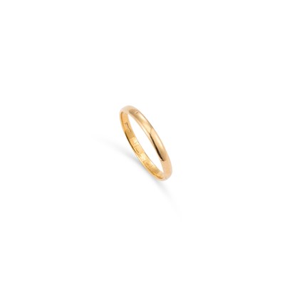 Lot 789 - A 22 CARAT GOLD BAND RING