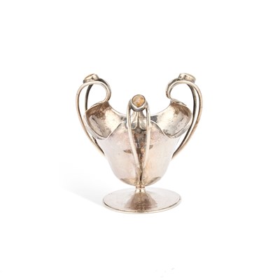 Lot 483 - AN ARTS AND CRAFTS SILVER THREE-HANDLED BOWL