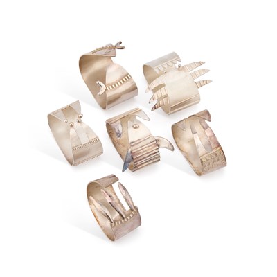 Lot 420 - A GROUP OF SIX ELIZABETH II SILVER NAPKIN RINGS