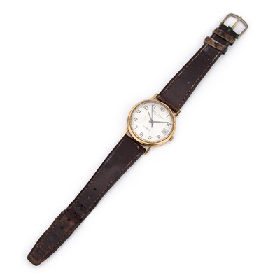 Lot 119 - A 9CT GOLD NORTHERN GOLDSMITHS STRAP WATCH