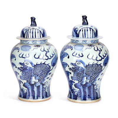 Lot 638 - A LARGE PAIR OF CHINESE BLUE AND WHITE 'QILIN' VASES AND COVERS