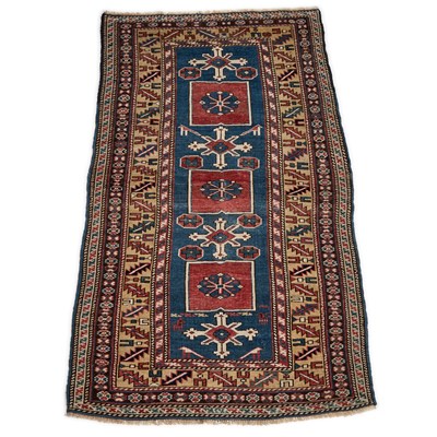 Lot 1109 - A CAUCASIAN RUG
