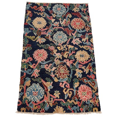 Lot 1115 - A TIBETAN CHINESE RUG