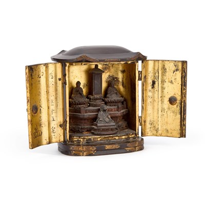 Lot 669 - A JAPANESE LACQUERED AND GILT TRAVELLING SHRINE (ZUSHI)