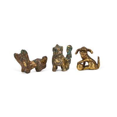 Lot 663 - THREE CHINESE GILT-BRONZE SCROLL WEIGHTS