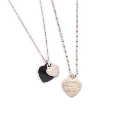 Lot 844 - TIFFANY & CO - TWO SILVER 'RETURN TO TIFFANY' PENDANTS ON CHAINS
