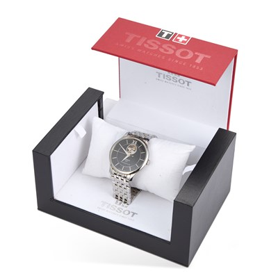 Lot 675 - A GENTS STEEL TISSOT BRACELET WATCH