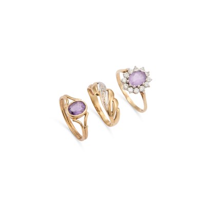 Lot 819 - THREE 9 CARAT GOLD GEM-SET RINGS