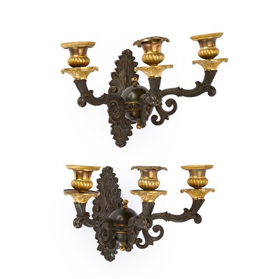 Lot 790 - A PAIR OF 19TH CENTURY PARCEL-GILT BRONZE THREE-LIGHT WALL SCONCES