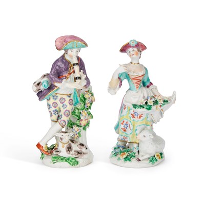 Lot 75 - A PAIR OF BOW FIGURES OF A PIPING SHEPHERD AND SHEPHERDESS