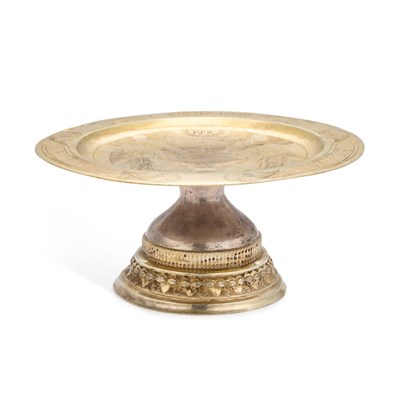 Lot 365 - A RUSSIAN SILVER GILT PATEN ON STAND