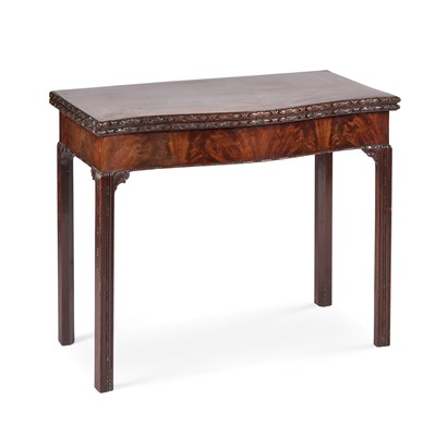Lot 1153 - A FINE GEORGE III CARVED MAHOGANY CONCERTINA ACTION SERPENTINE FOLDOVER CARD TABLE