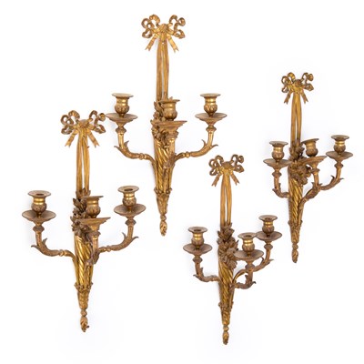 Lot 1077 - A GOOD SET OF FOUR ORMOLU THREE-LIGHT WALL SCONES