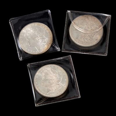 Lot 35 - THREE USA MORGAN DOLLARS
