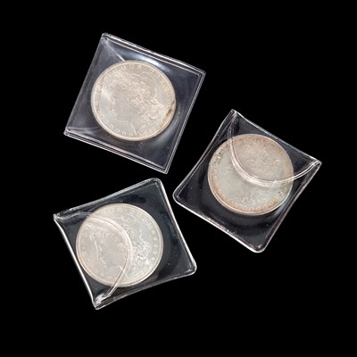 Lot 5 - THREE USA MORGAN DOLLARS