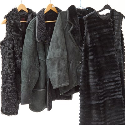Lot 212 - TWO BLACK SHEARLING COATS AND TWO FUR WAISTCOATS