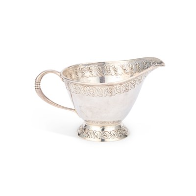 Lot 284 - A GEORGE VI SILVER CREAM JUG