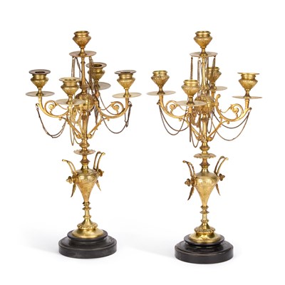 Lot 127 - A PAIR OF VICTORIAN BRASS FIVE-LIGHT CANDELABRA