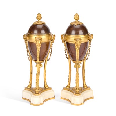 Lot 700 - A PAIR OF LOUIS XVI STYLE PARCEL-GILT BRONZE CASSOLETTES