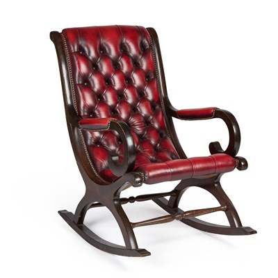Lot 1059 - A PERIOD STYLE DEEP-BUTTONED RED LEATHER UPHOLSTERED ROCKING CHAIR