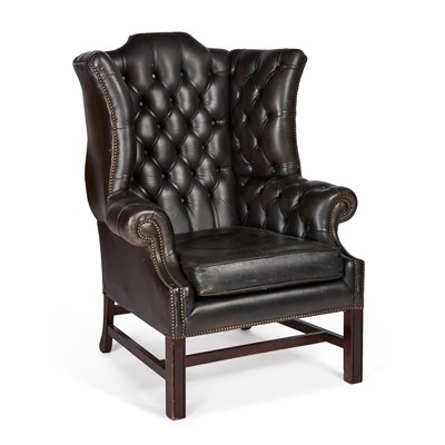 Lot 870 - A GEORGIAN STYLE LEATHER-UPHOLSTERED MAHOGANY WING-BACK ARMCHAIR