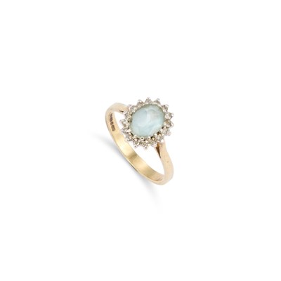 Lot 519 - A 9 CARAT GOLD AQUAMARINE AND DIAMOND CLUSTER RING