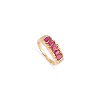 Lot 565 - A 9 CARAT RUBY AND DIAMOND RING