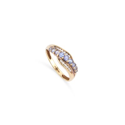 Lot 567 - A 9 CARAT GOLD TANZANITE AND DIAMOND RING
