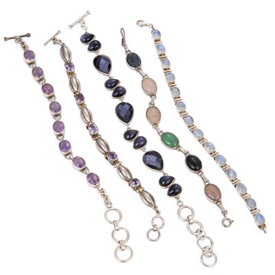 Lot 590 - A GROUP OF GEM-SET SILVER BRACELETS