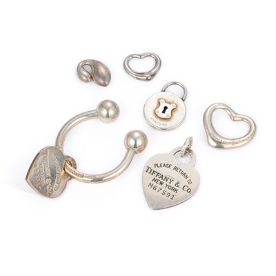 Lot 569 - A GROUP OF TIFFANY & CO SILVER PENDANTS AND A KEYRING